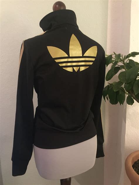 adidas schwarz gold mit lasche neue kollektion|Goldene Outfits & Accessoires .